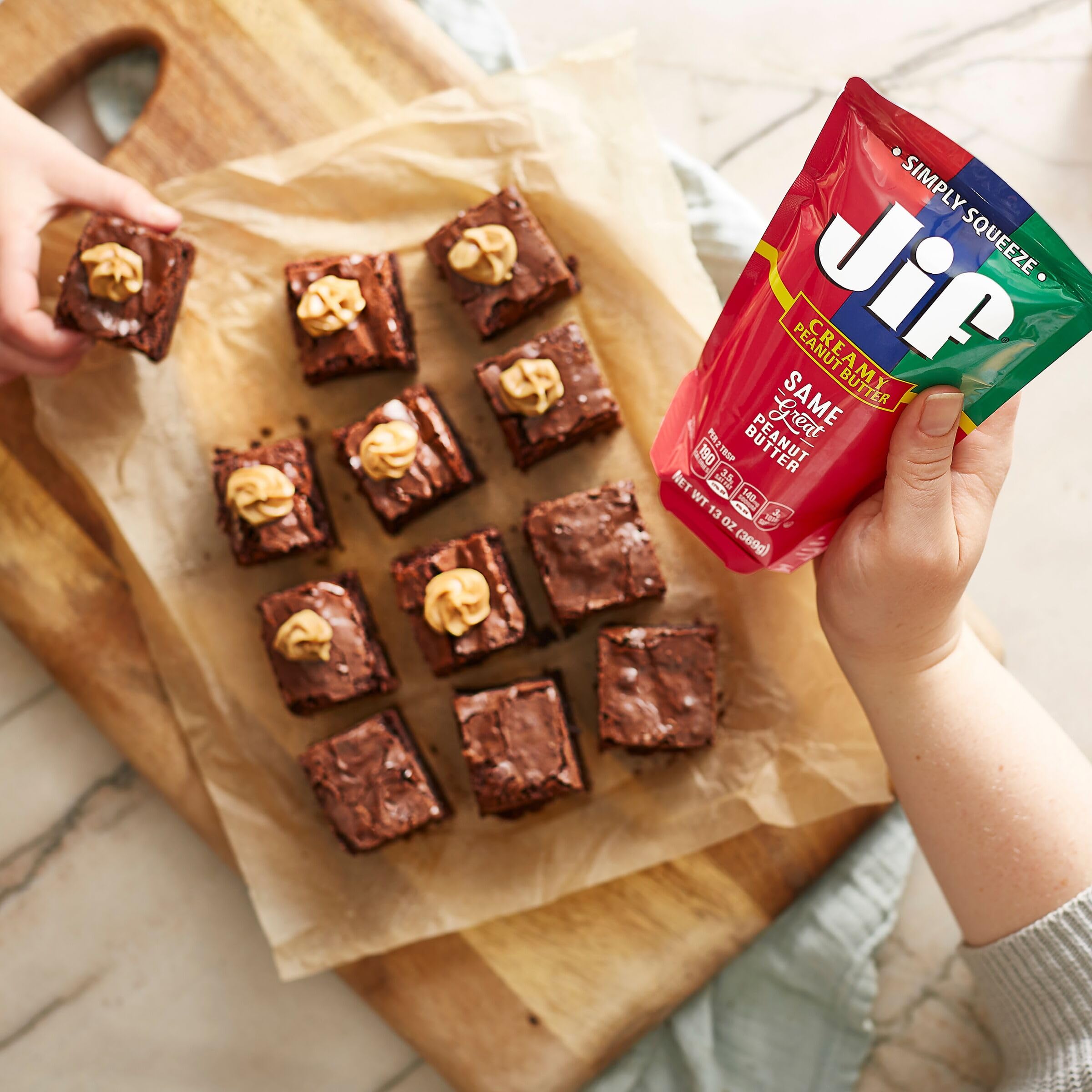 On-the-go snacking with Jif Squeeze during travel or practice.