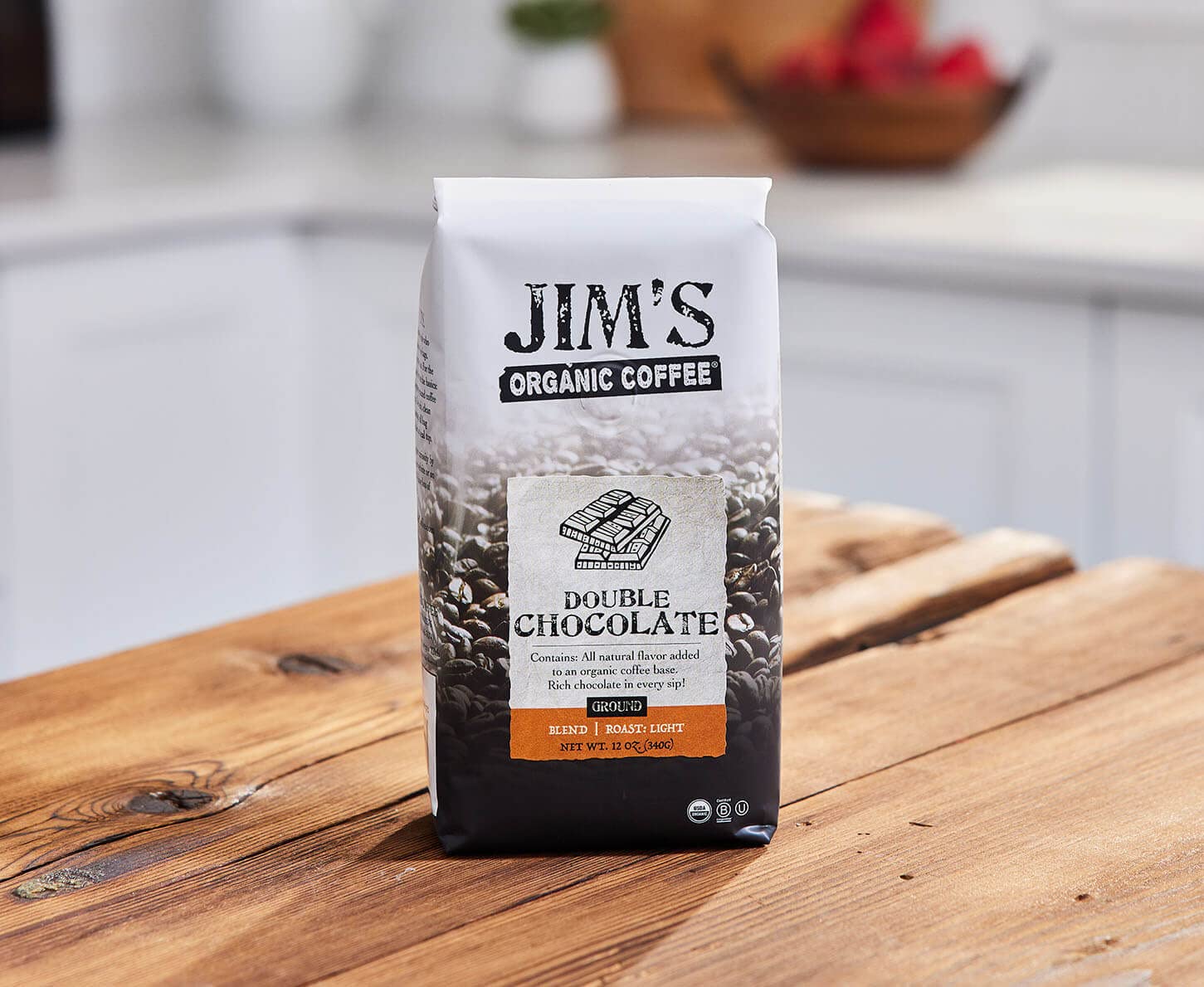 Jim's Organic Coffee small-batch roast process highlighting craftsmanship and consistency.
