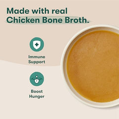 Close up of real chicken and bone broth in Jinx Kibble Sauce