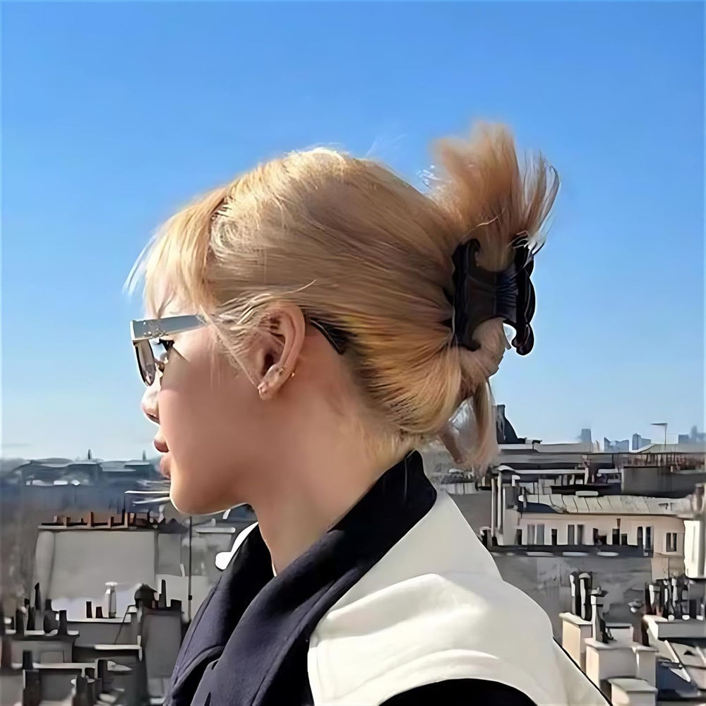 JITUIHOM pink acetate clip secures buns with comfortable grip.