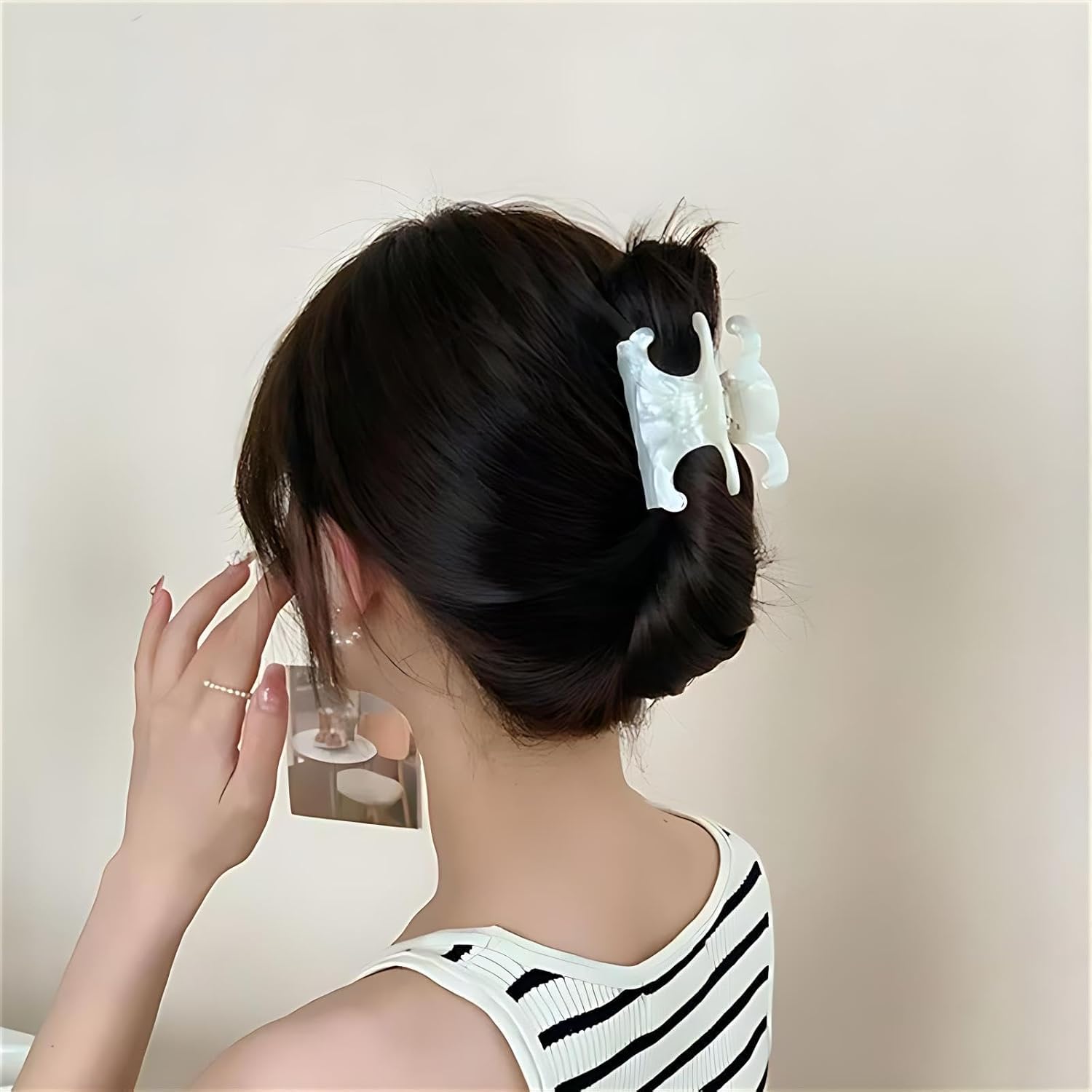 JITUIHOM shell-white butterfly clip adds subtle shine to casual outfits.