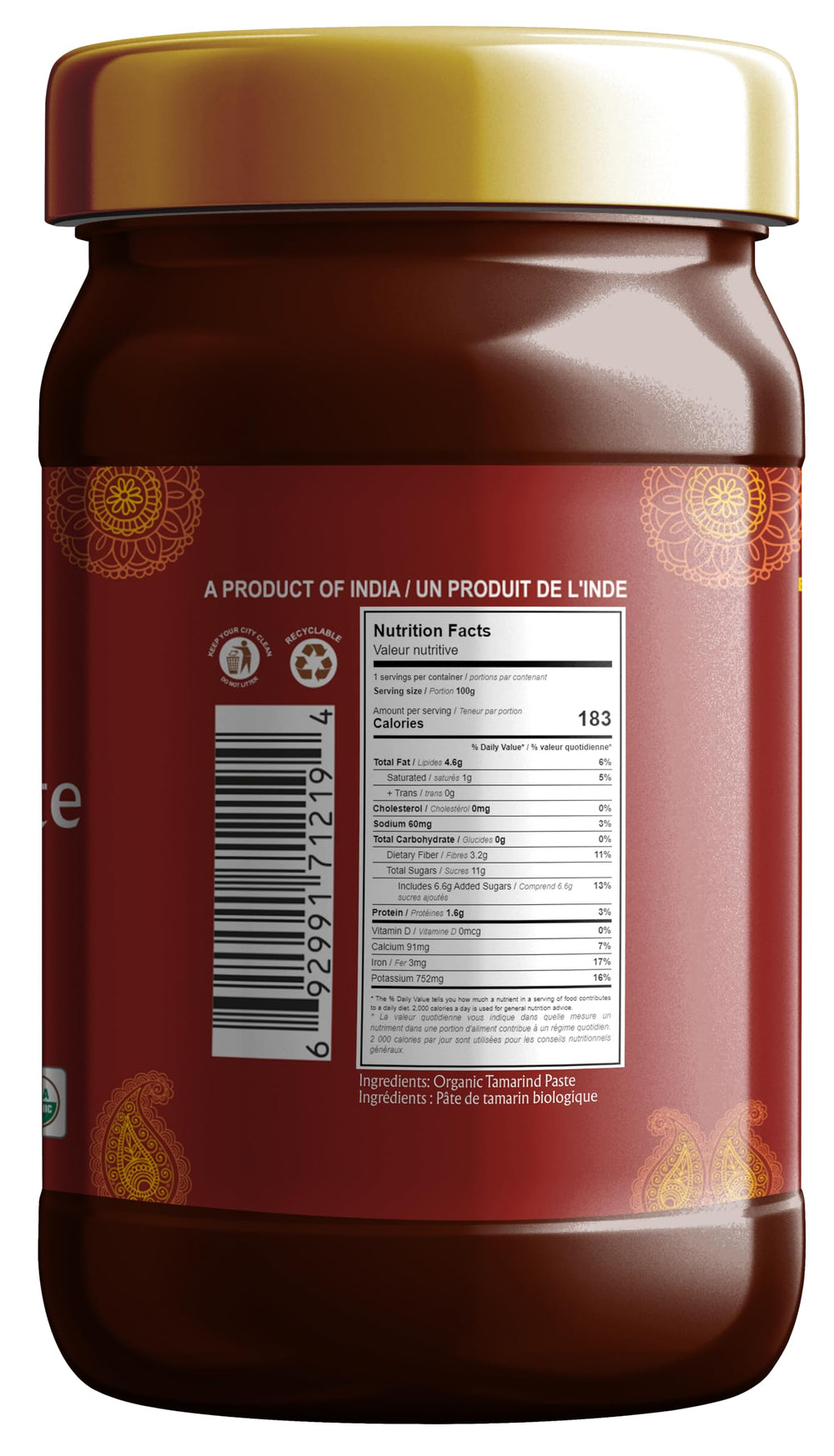 Pouring tamarind paste from the bottle for curries and noodles.