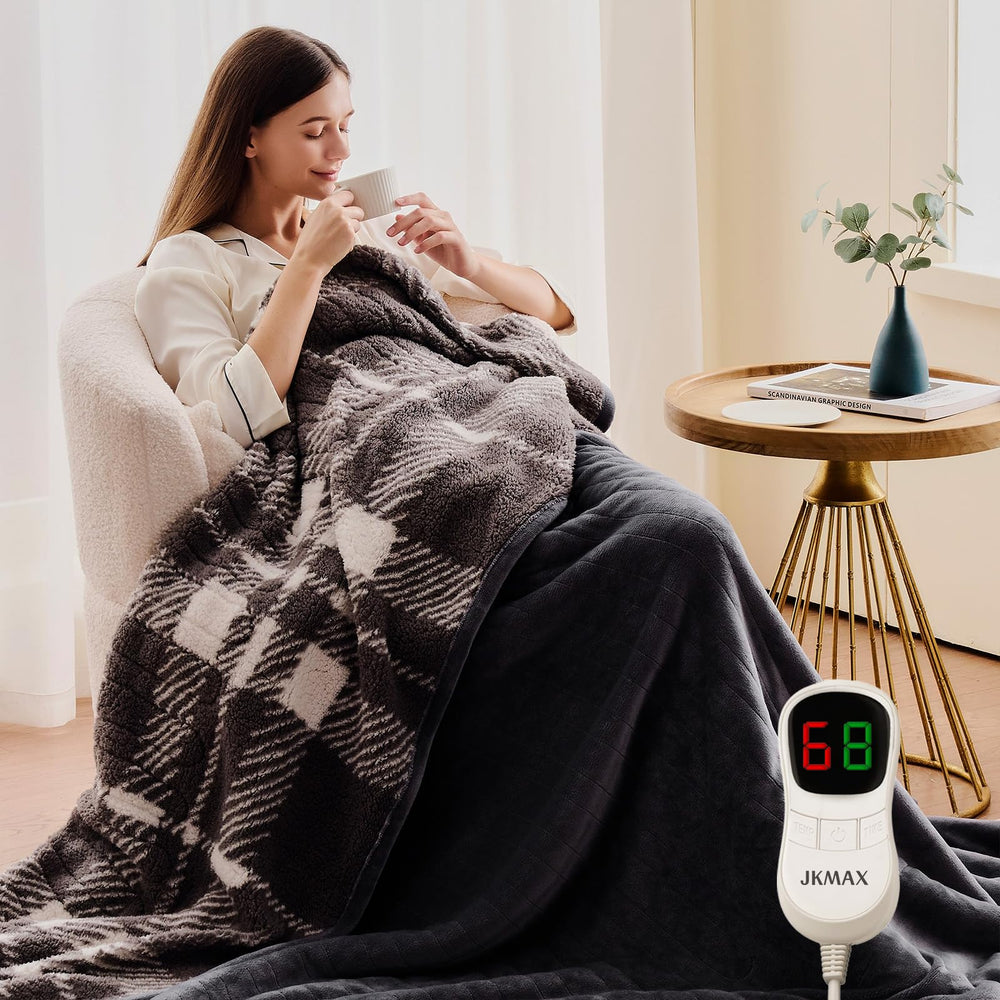 JKMAX heated blanket control panel close-up demonstrates simple three-button operation.