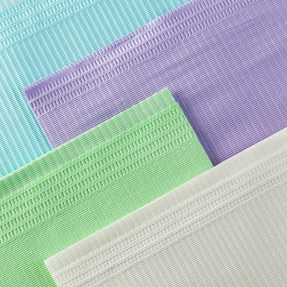 JMU dental bibs used in a clinical setting for patient protection