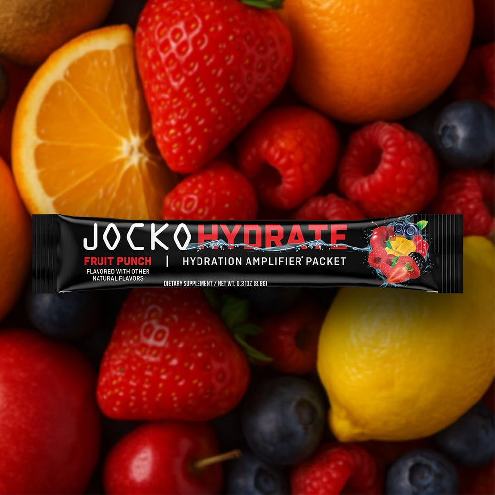 Pouring Jocko Fuel Hydrate into a bottle during training.
