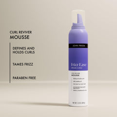 John Frieda Dream Curls Mousse close-up of Abyssinian and Rose Hip oil ingredients