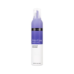 John Frieda Dream Curls mousse bottle on display ready to define curls