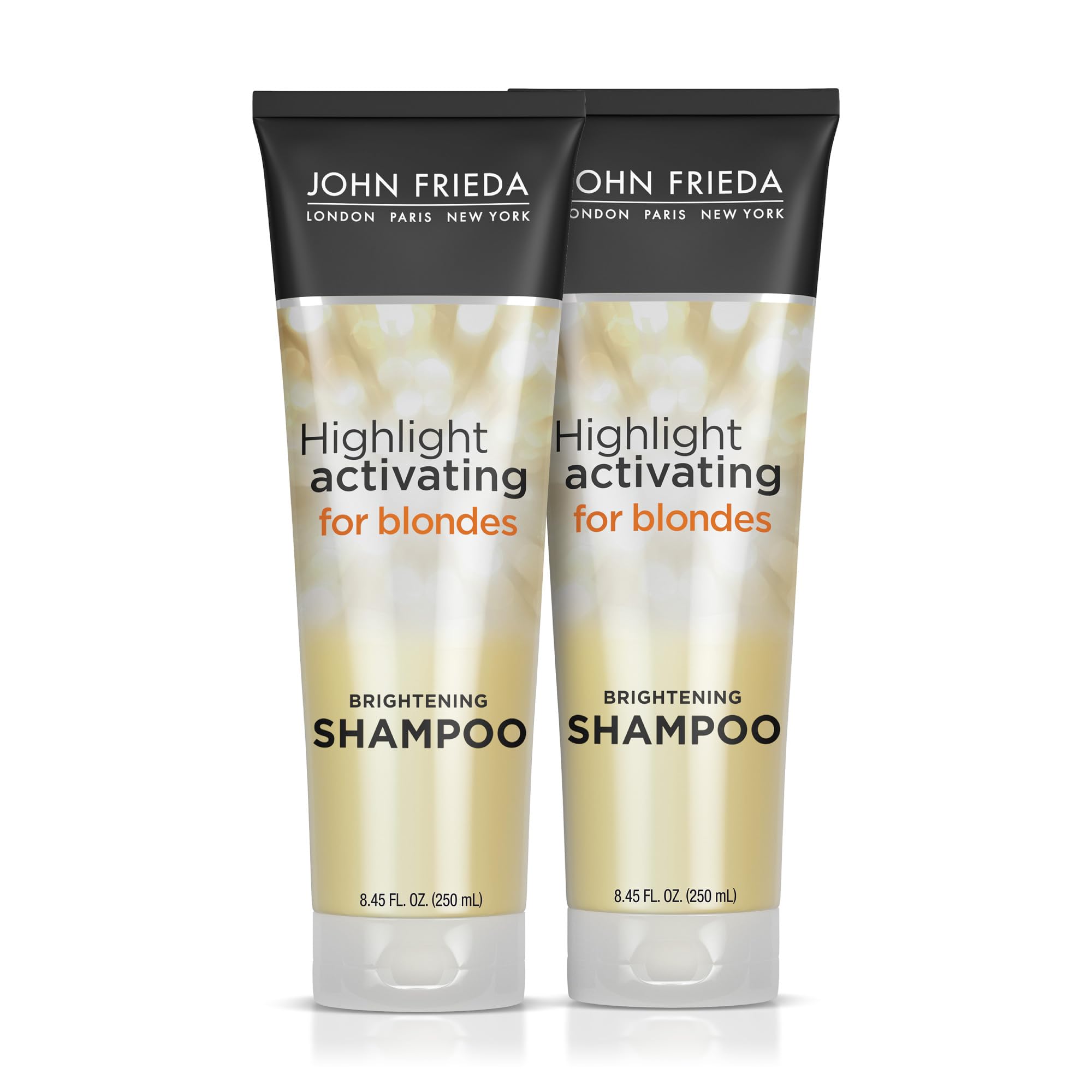 John Frieda Sheer Blonde Brightening Shampoo bottle reviving dull highlights.