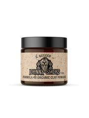 Johnny Slicks Formula 49 clay jar showing natural finish and firm hold.