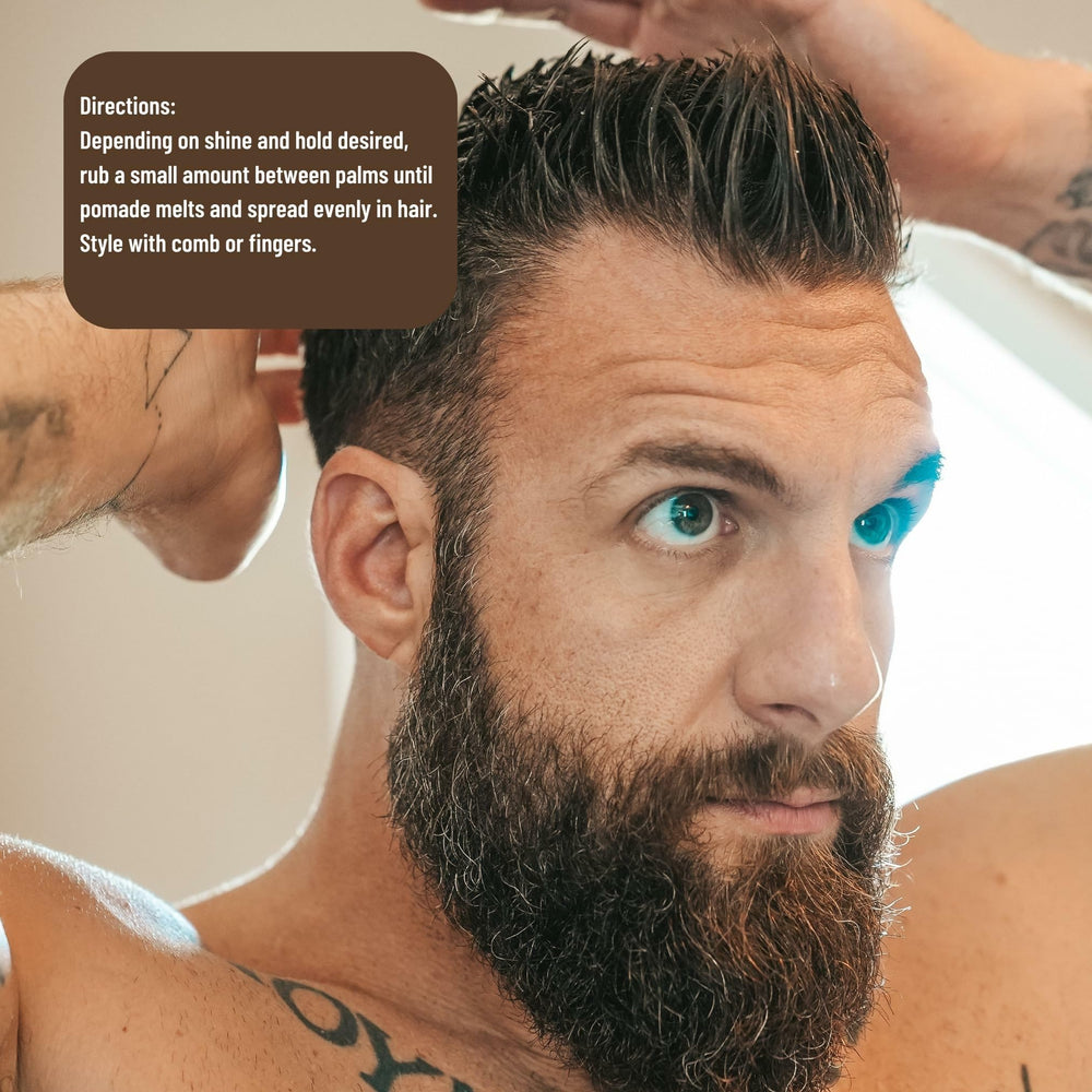 Johnny Slicks styling in progress with a comb for defined texture.