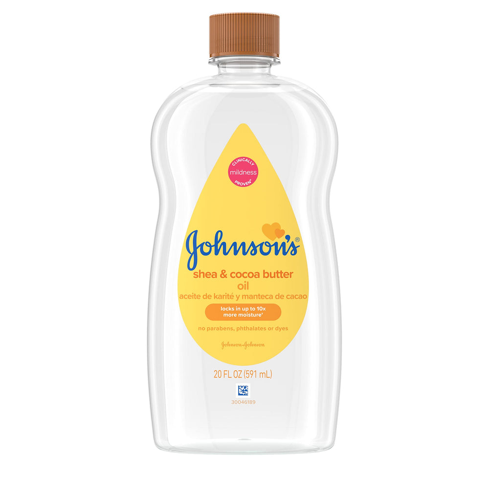 Johnson's Baby Oil bottle closeup, mineral oil for gentle moisture on skin.