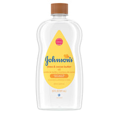 Johnson's Baby Oil bottle closeup, mineral oil for gentle moisture on skin.