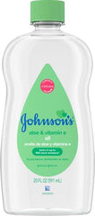 Johnson's Baby Oil bottle pour demonstrates easy spreading for soothing baby massage.