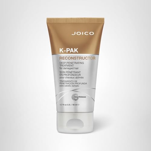 Joico K-PAK Reconstructor stylist applying product in salon setting