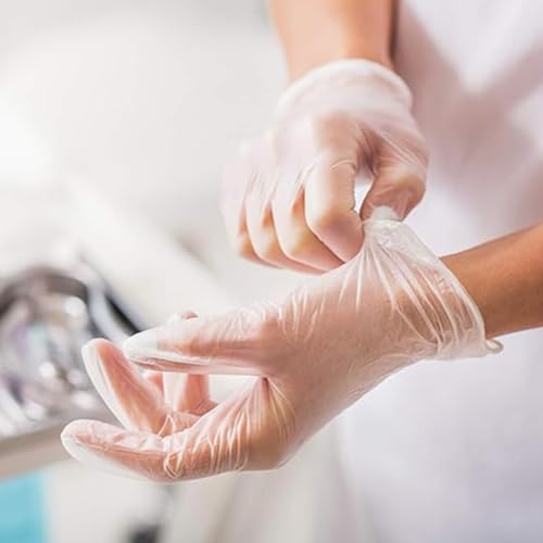 Jointown Basic vinyl gloves on hand with ambidextrous fit for versatile tasks.
