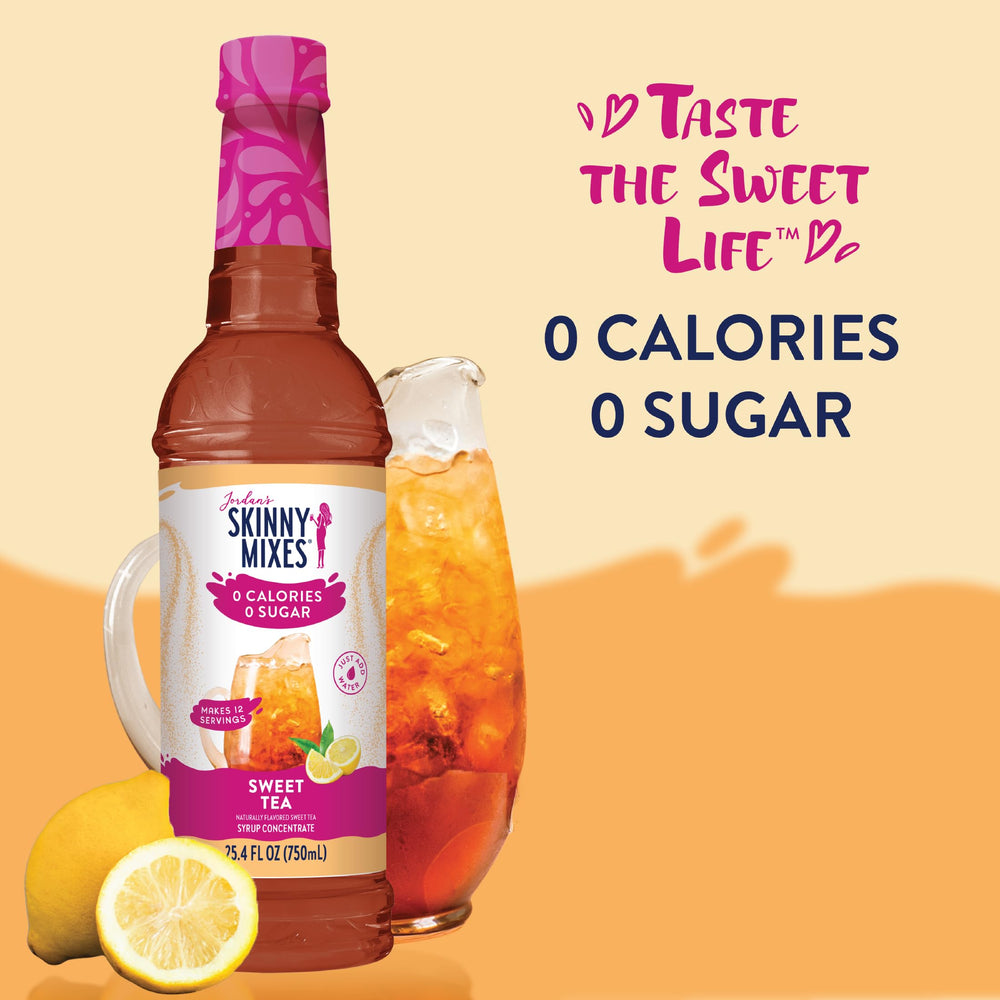 A bottle of Jordan's Skinny Mixes Sugar Free Syrup beside a tall glass of iced tea