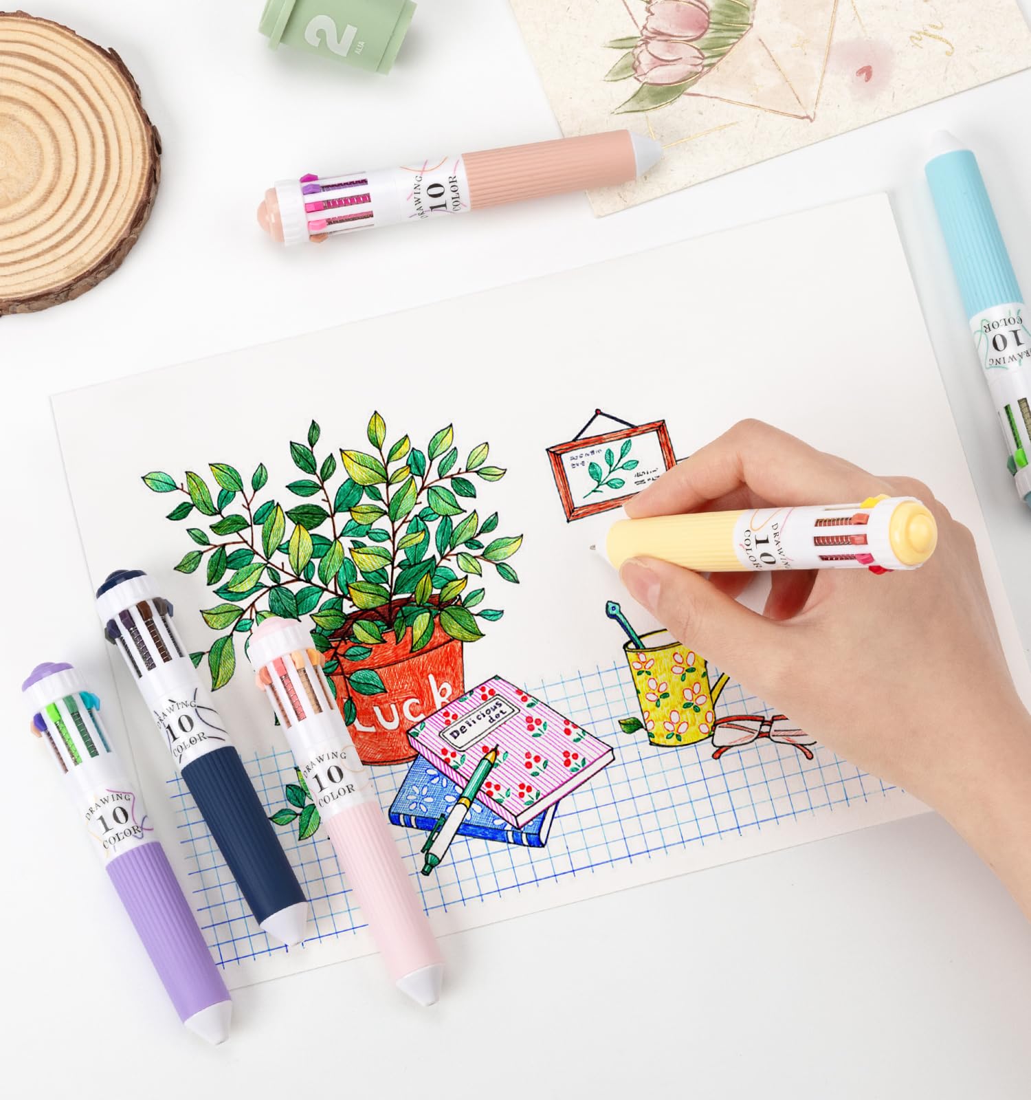 Joyask 10-in-1 color pens offer 57 hues in one pen for creative journaling.