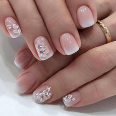 Jsiallye glue-on nails application on hand for salon-like results at home.