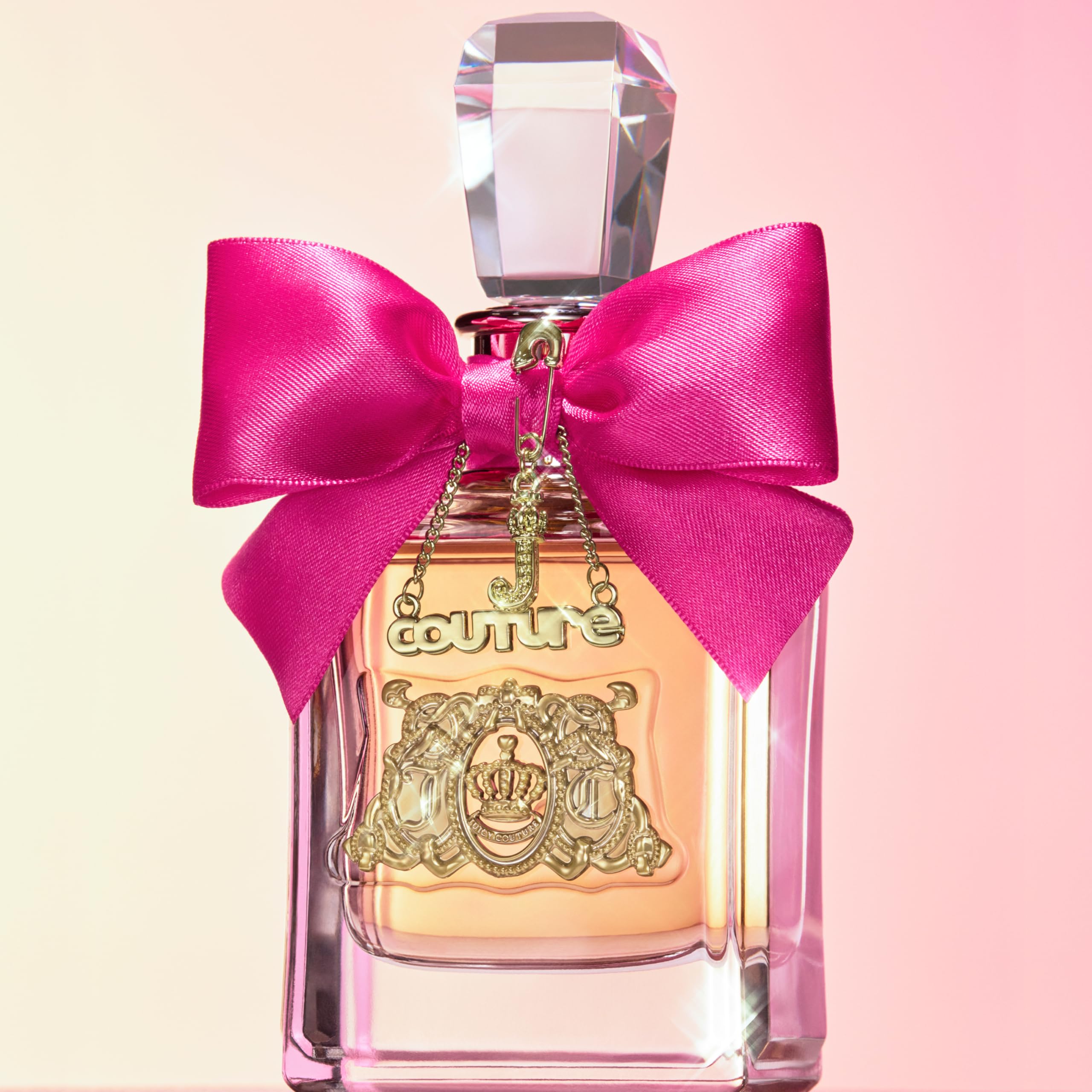 Vanity display of Juicy Couture Viva La Juicy EDP with warm lighting for daily luxury.