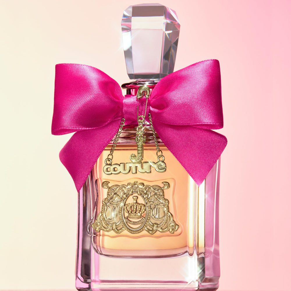 Vanity display of Juicy Couture Viva La Juicy EDP with warm lighting for daily luxury.