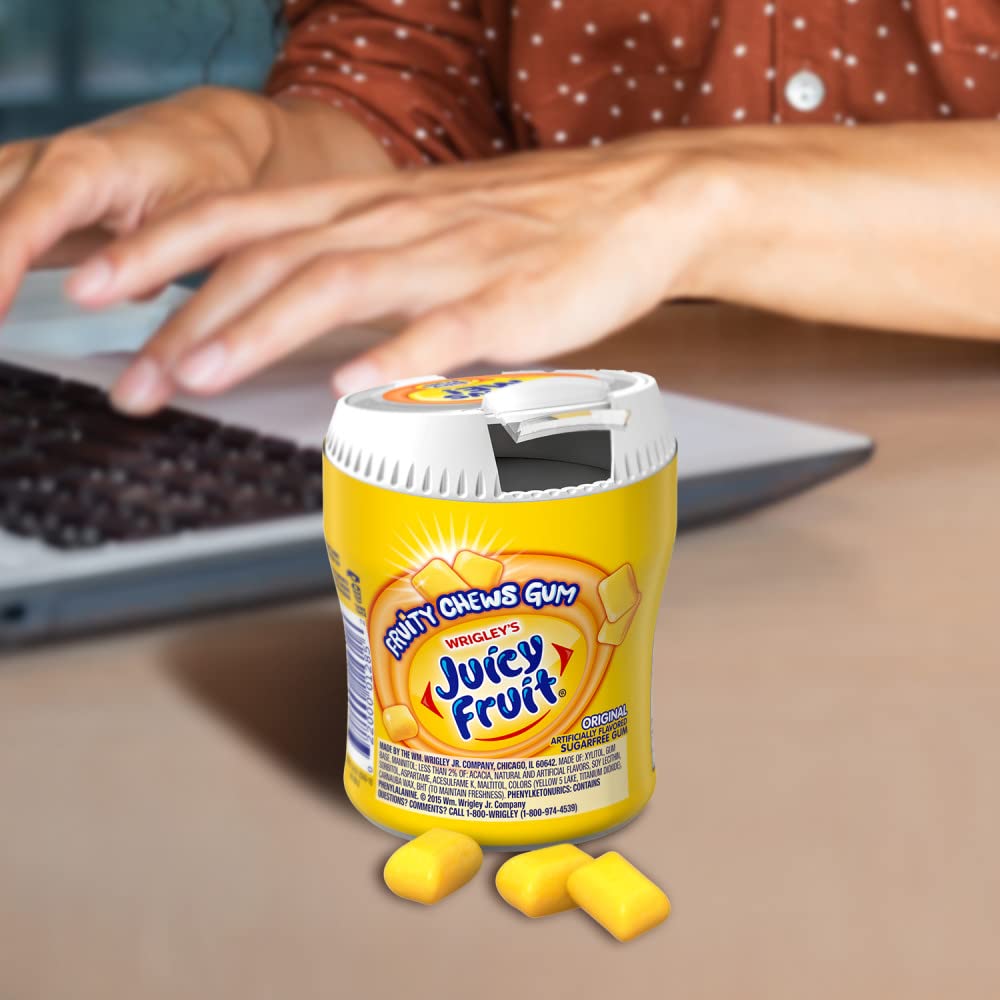 Juicy Fruit Gum sugar-free piece close-up highlights crisp texture and fruity chew.