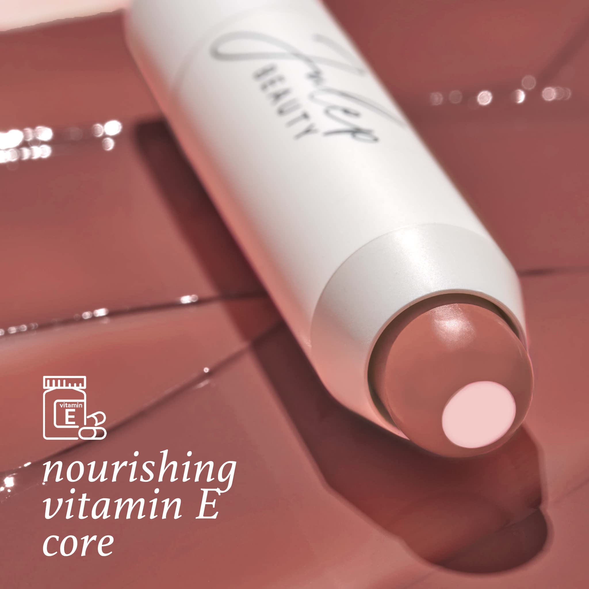 Julep It's Balm Tint hydrating feel on lips in lifestyle photo emphasizes long-lasting moisture.