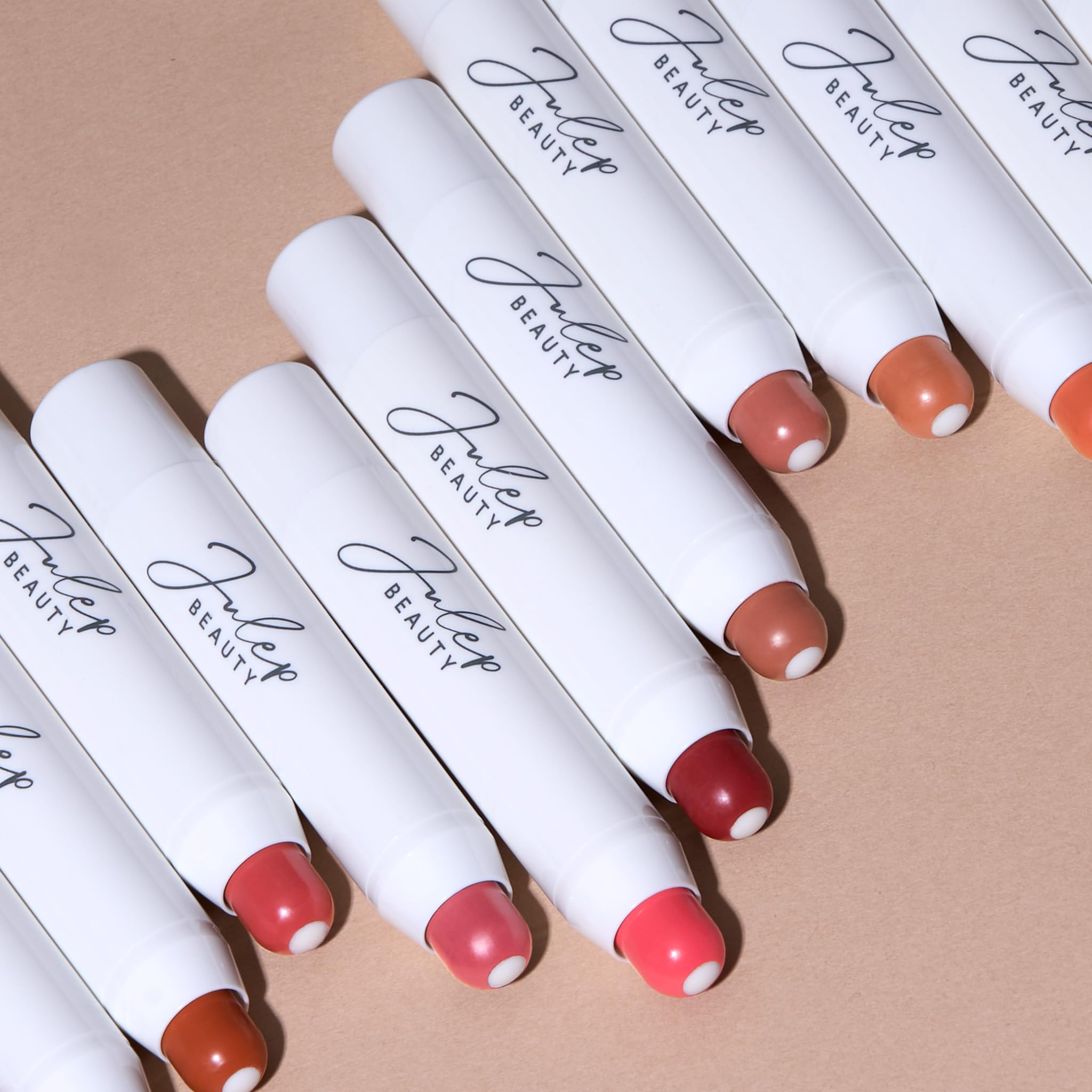 Julep It's Balm Tint premium cosmetics shot highlighting soft color payoff.