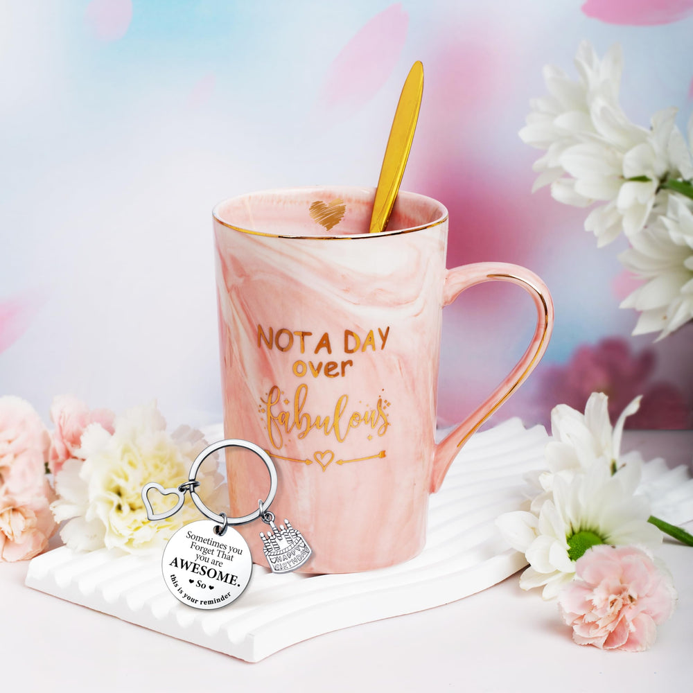 Jumway Not A Day Over Fabulous mug with spoon, makeup bag, and greeting card.