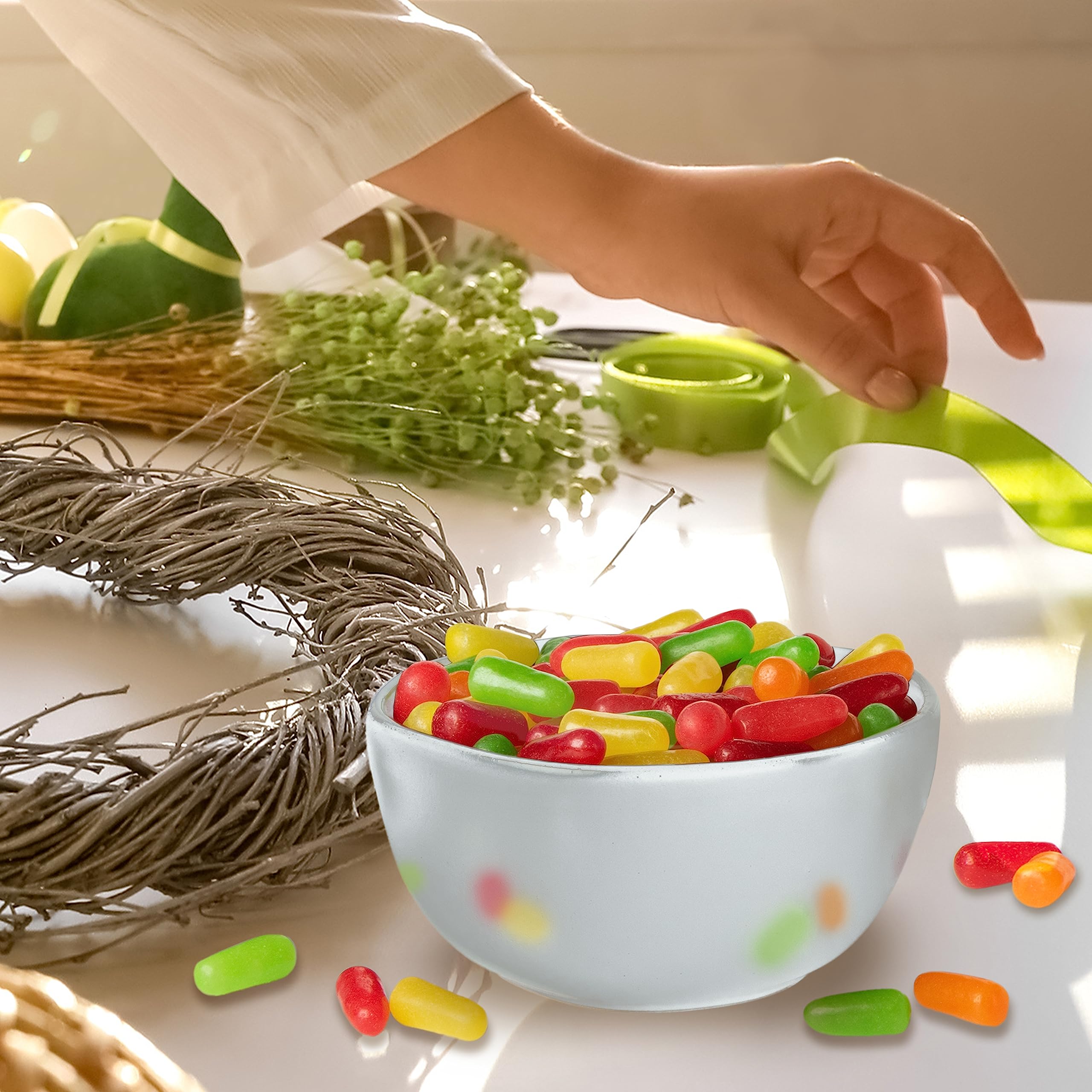Just Born Mike and Ike Original Fruits in backpack, convenient on-the-go snack.