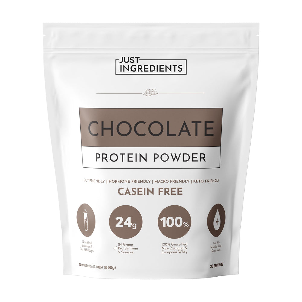 JUST INGREDIENTS Chocolate Protein Powder jar emphasizes grass-fed whey and plant protein blend for recovery support.