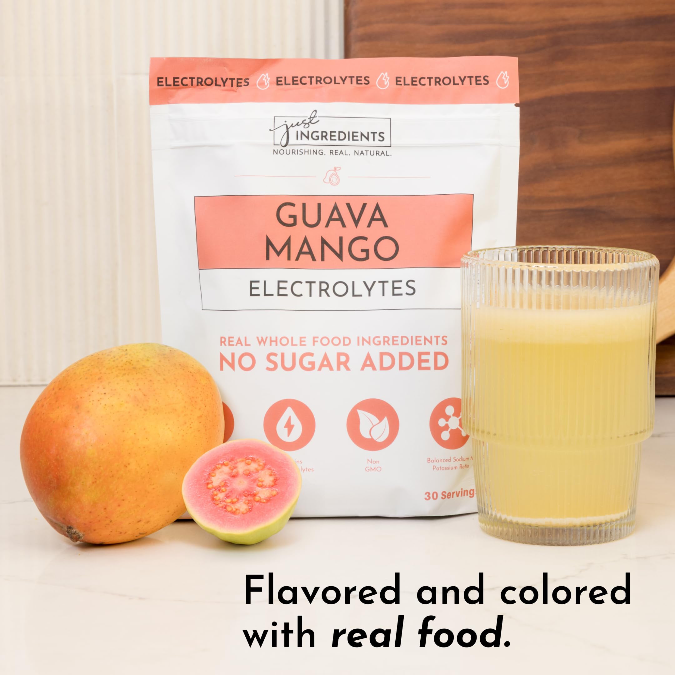JUST INGREDIENTS Guava Mango Electrolytes sea salt imagery emphasizes mineral balance.