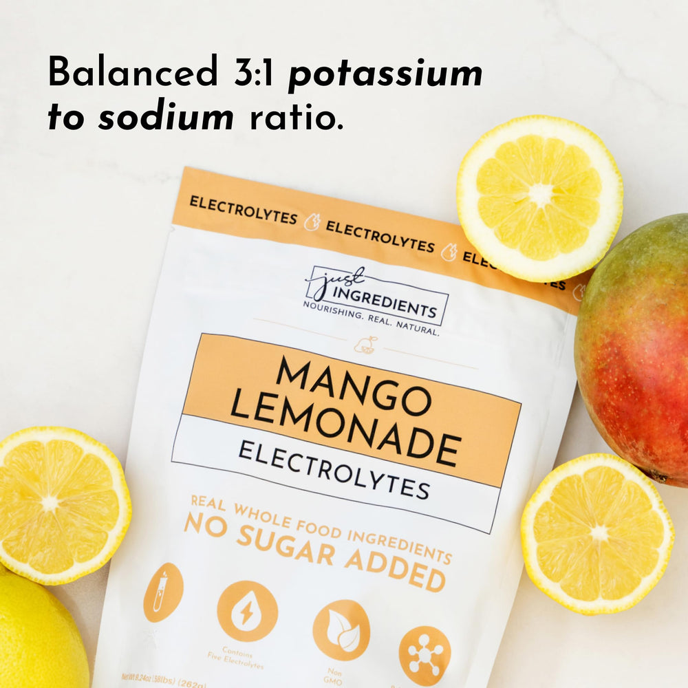 JUST INGREDIENTS Mango Lemonade electrolyte drink mix tub packaging showcasing clean ingredients
