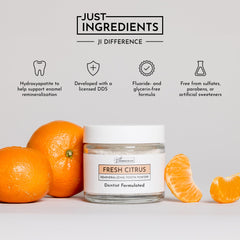 Just Ingredients Remineralizing Tooth Powder texture close-up shows natural minerals for gentle cleaning.