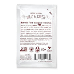 Justins Almond Cinnamon Squeeze Pack spread on toast, creamy texture.
