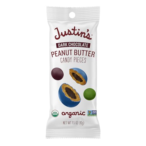 Justin's dark chocolate peanut butter candy pieces, bags closeup highlighting single-serve convenience