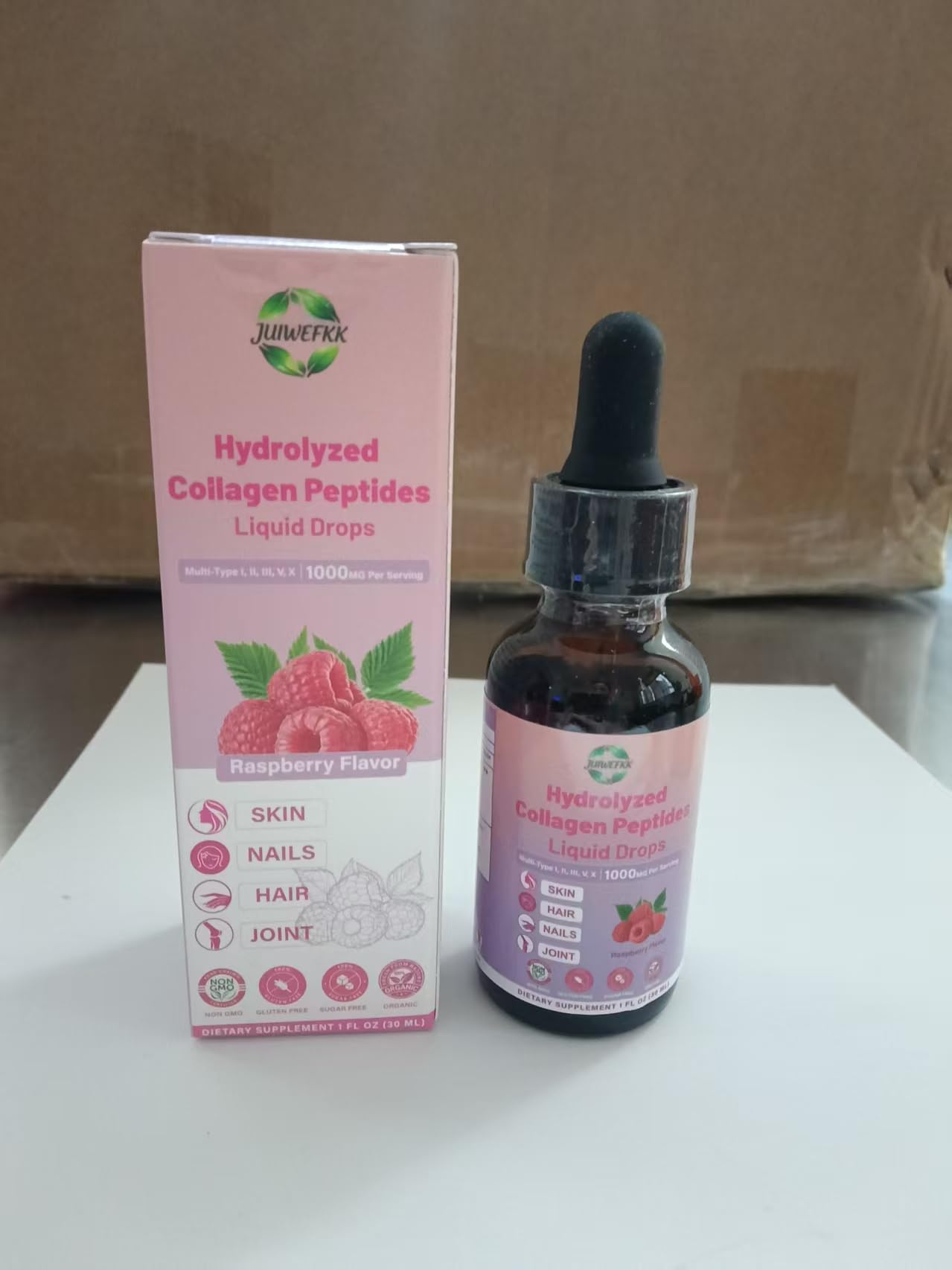 JUIWEFKK hydrolyzed collagen liquid drop being poured for precise dosing.