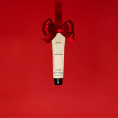 JVN No Heat Air Dry Cream on hair texture showing natural definition and shine.