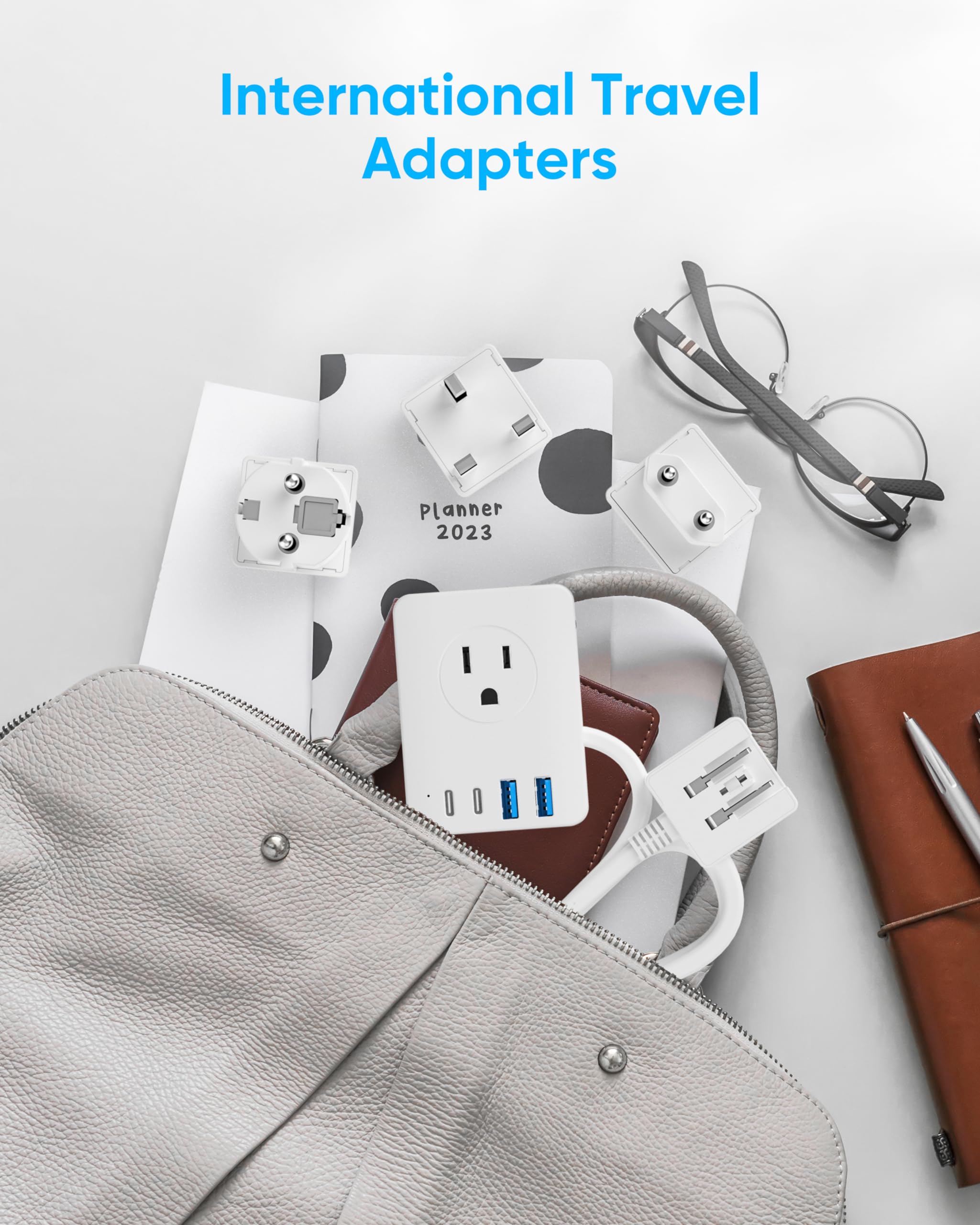Kakyanill compact travel adapter fits easily in a carry-on bag.