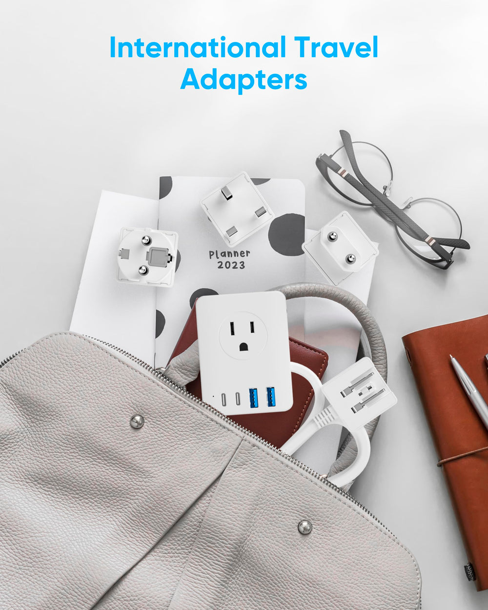 Kakyanill compact travel adapter fits easily in a carry-on bag.