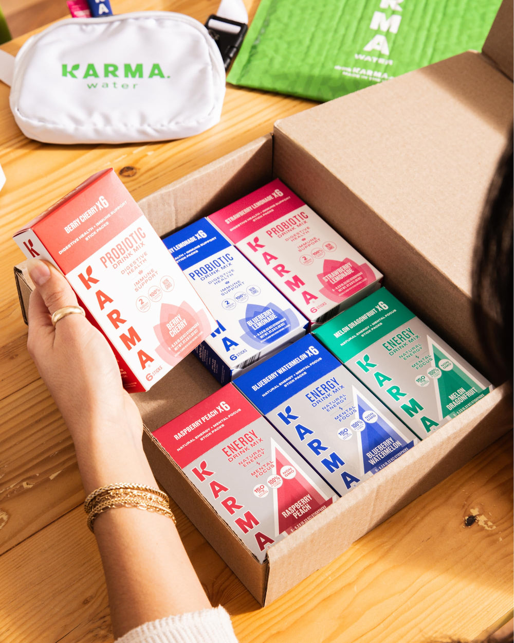 Karma Probiotic Hydration six-pack in gym bag for travel