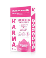 Glass of water with Karma Probiotic Hydration Stick shows easy mixability and vibrant flavor.