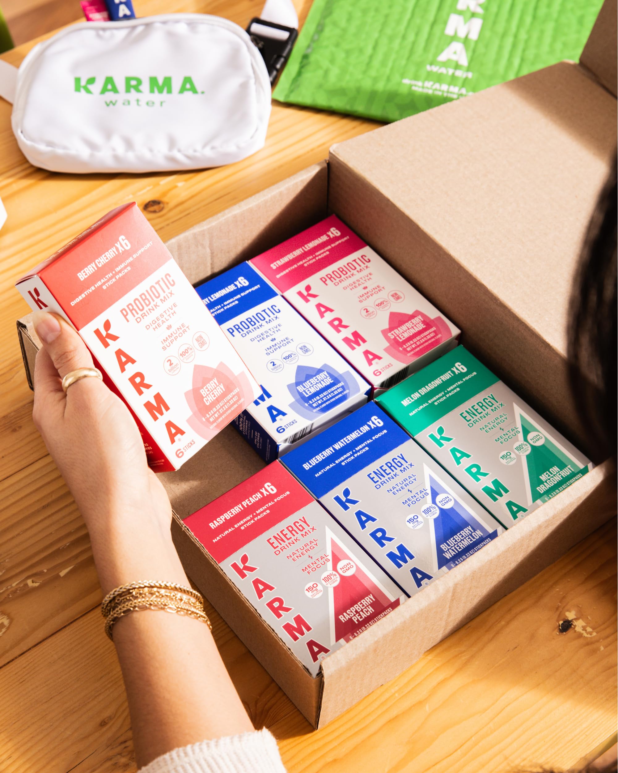 Front label of Karma Probiotic Hydration Stick showing non-GMO and vegan claims.