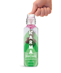 Karma Probiotic Water label close-up highlighting BC30 probiotic and vitamin blend.