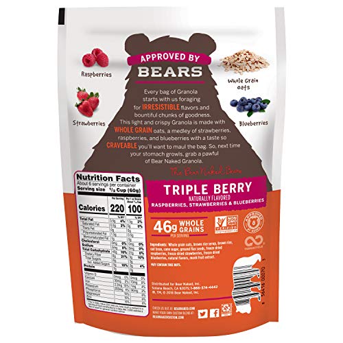 Kellogg's Bear Naked Triple Berry Crunch bowl with milk and berries.