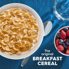 Pouring Kellogg's Special K into a bowl for a quick, low-fat breakfast.