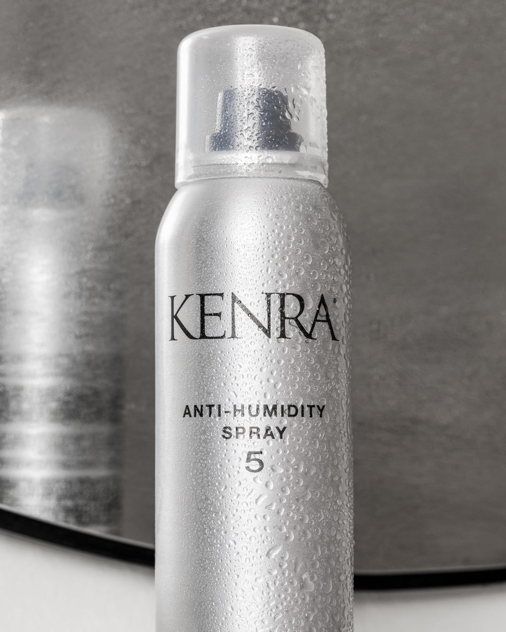 Kenra Anti-Humidity Spray 5 travel-size bottle ideal for on-the-go humidity protection