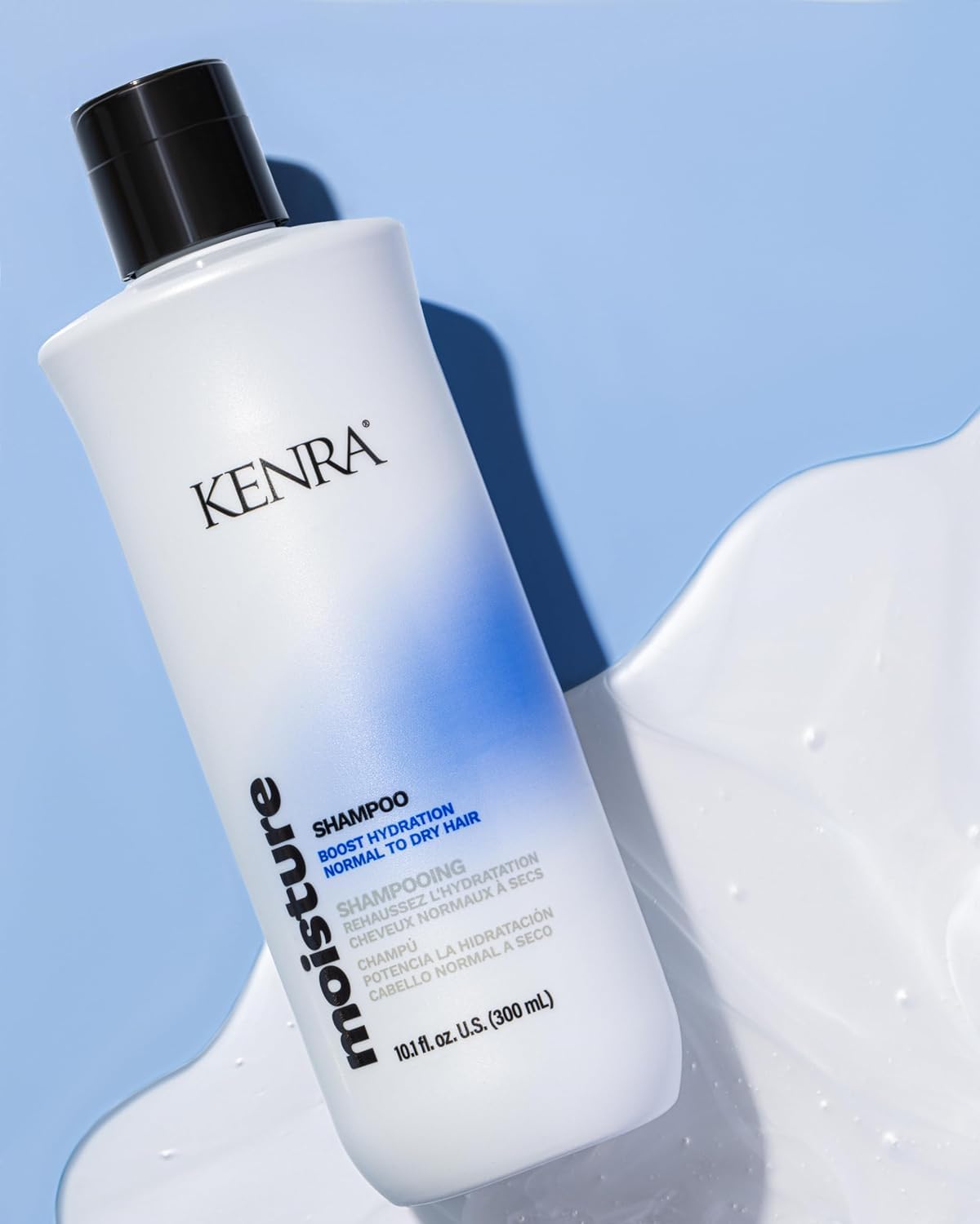 Kenra Moisture Shampoo pour showing easy rinse and even moisture distribution.