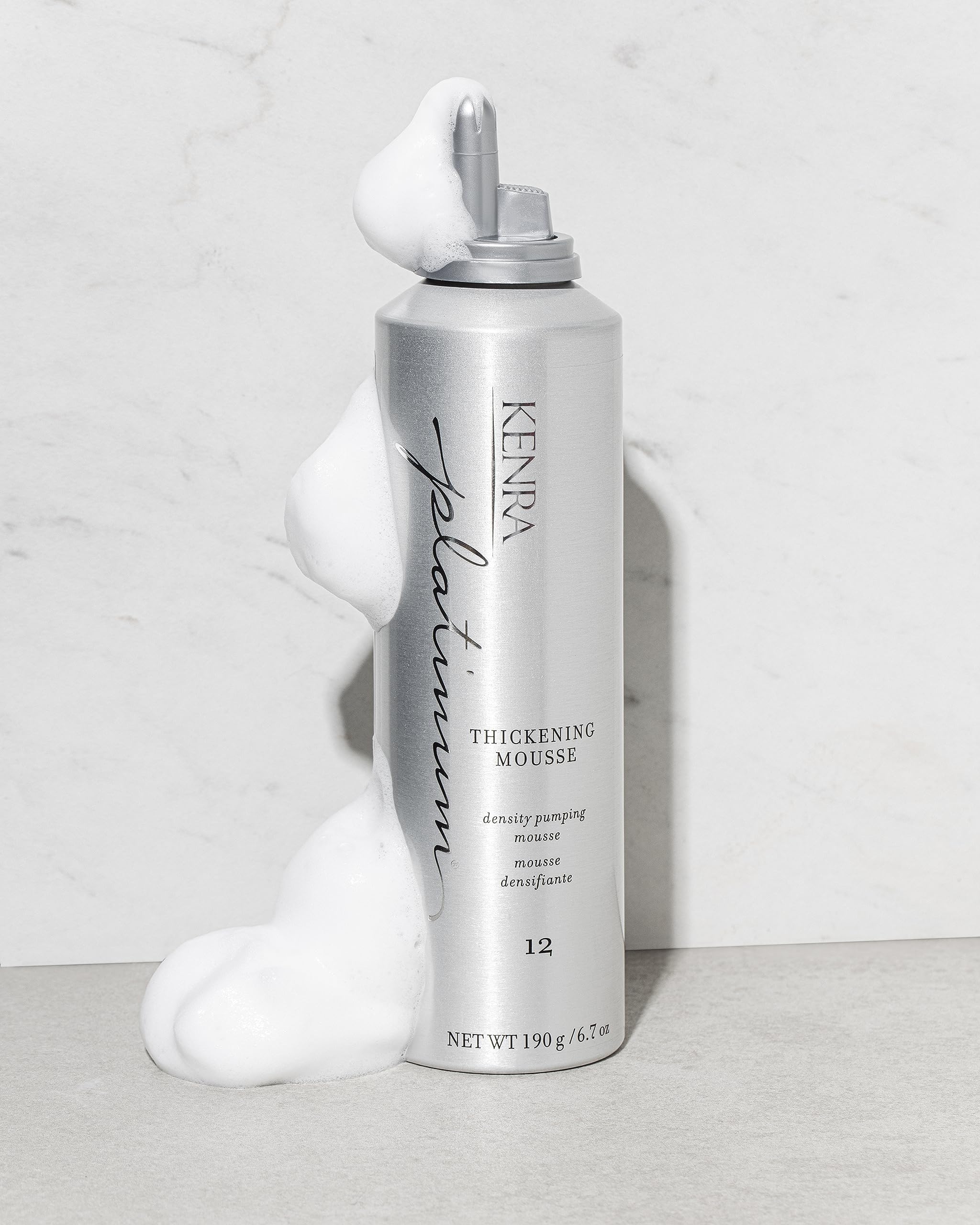 Kenra Platinum Thickening Mousse on damp hair ready for styling.