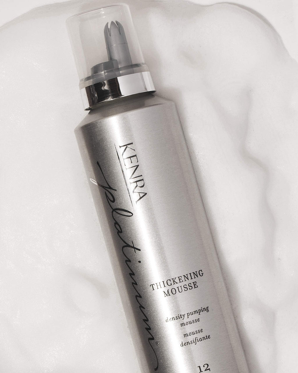 Kenra Platinum Thickening Mousse humidity protection close-up highlighting lasting volume.