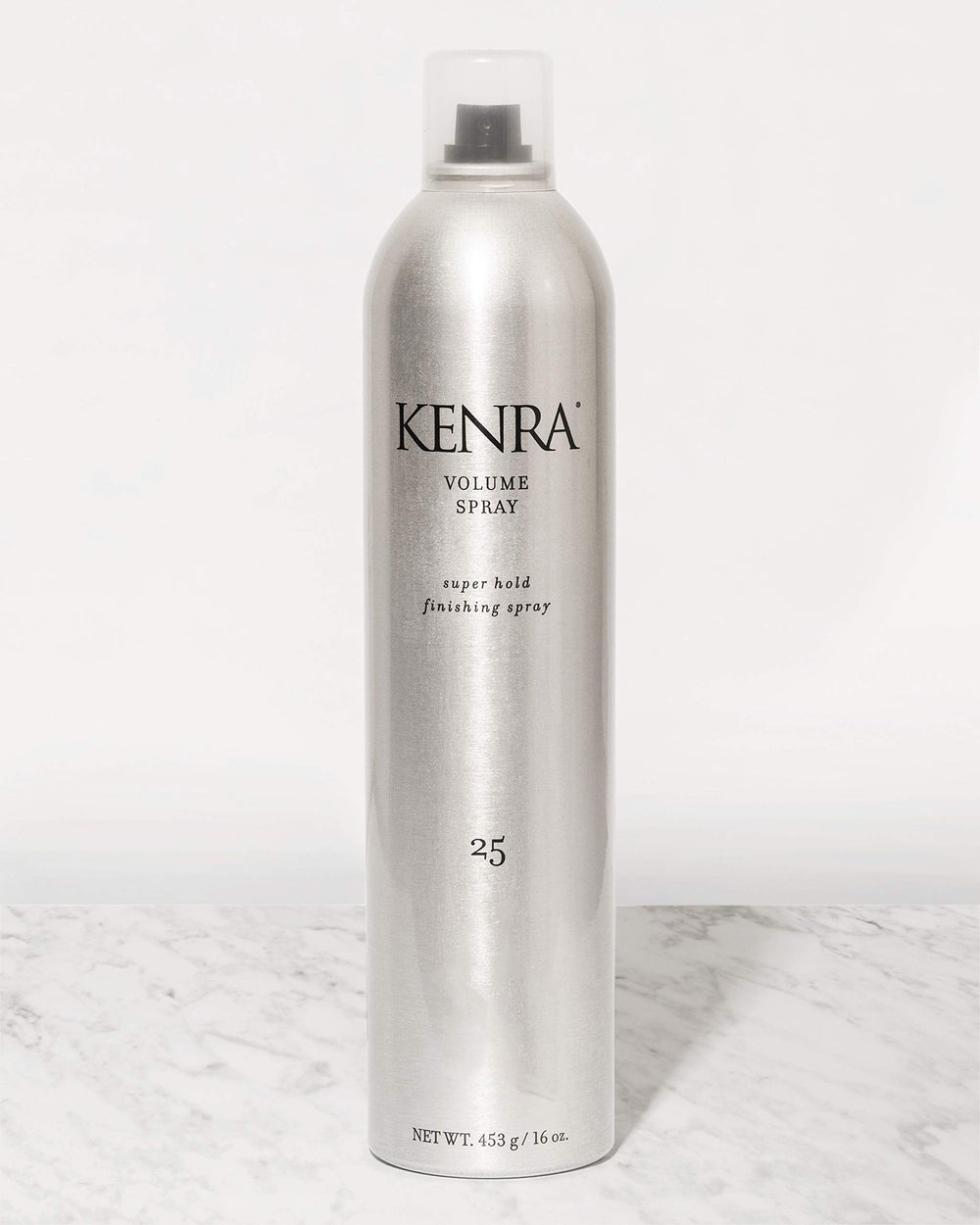 Kenra Volume Spray 25 wind resistance visual; holds style in breezy conditions